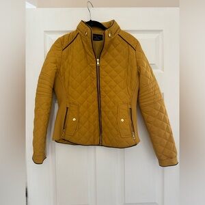 Gold light jacket, super cute.